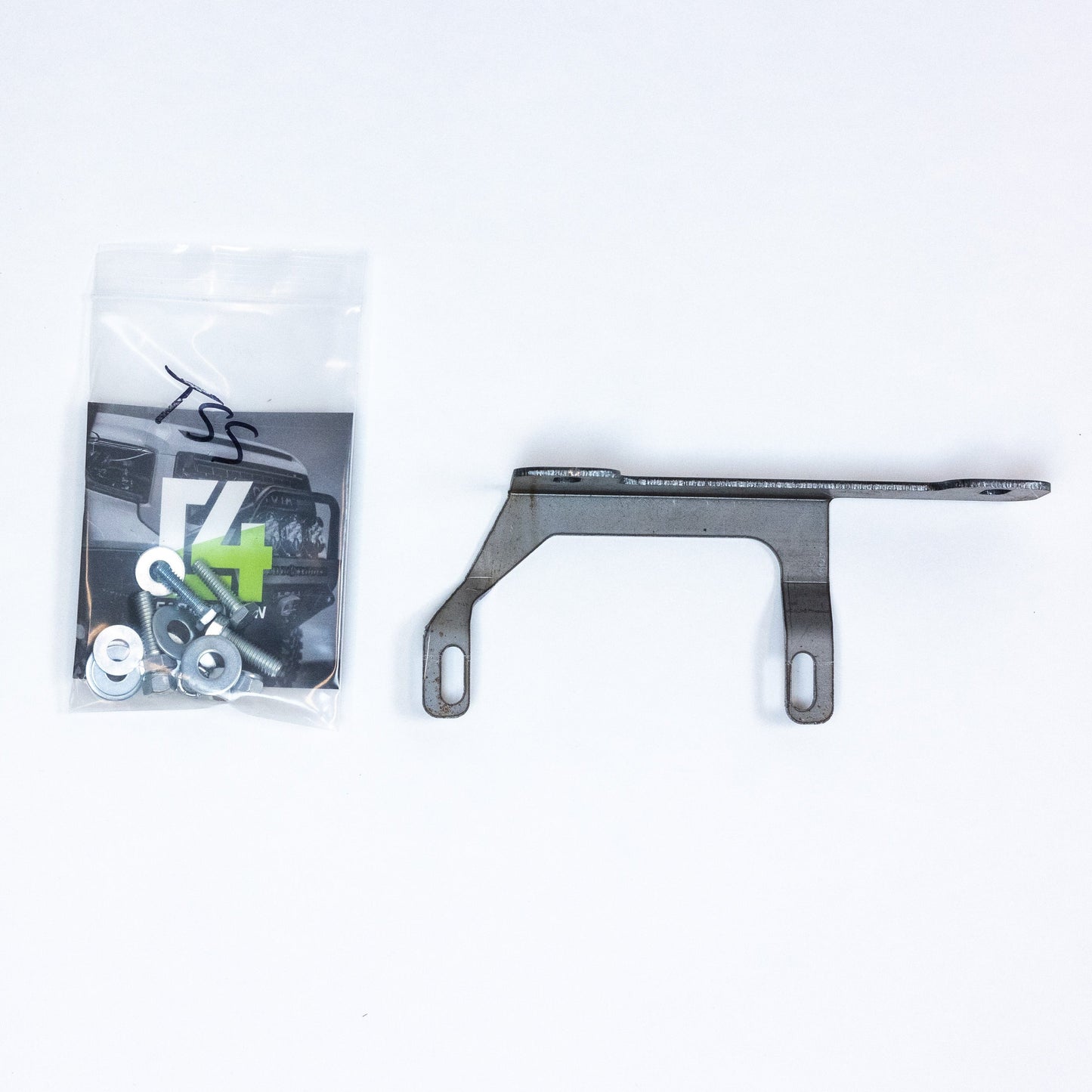 View of the complete TSS Relocation Kit to include the steel bracket and hardware set.